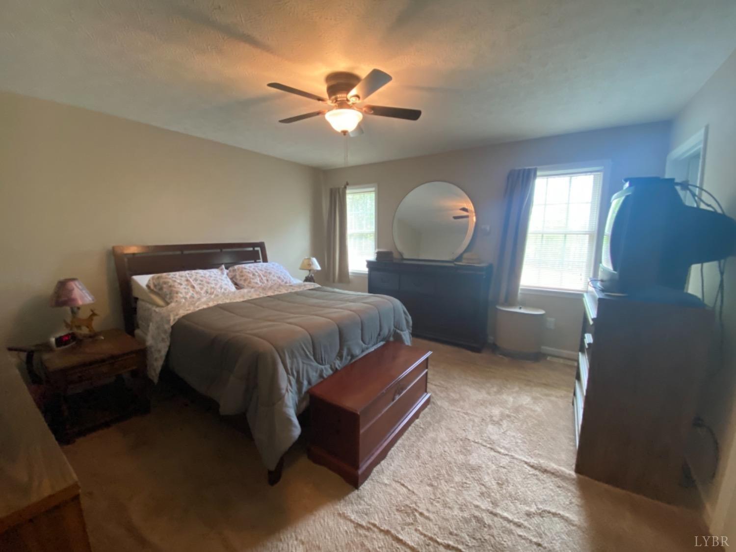 533 Pumping Station Road Spout Spring, VA 24593 - Photo 10 of 19 a bedroom with a bed and window