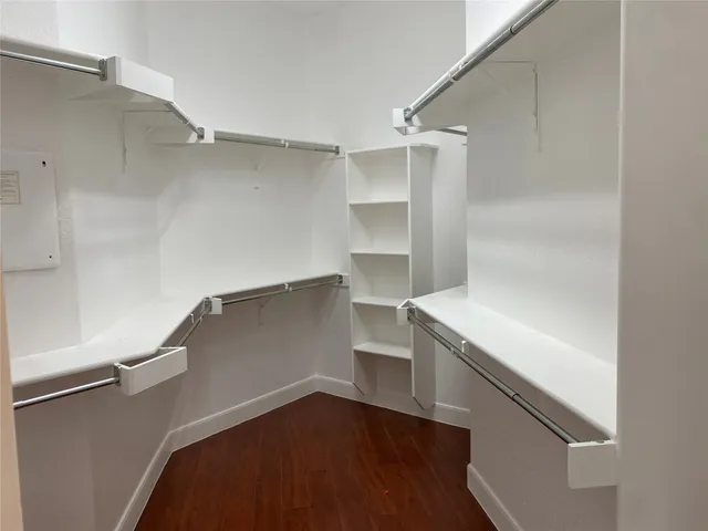 a view of an empty walk in closet