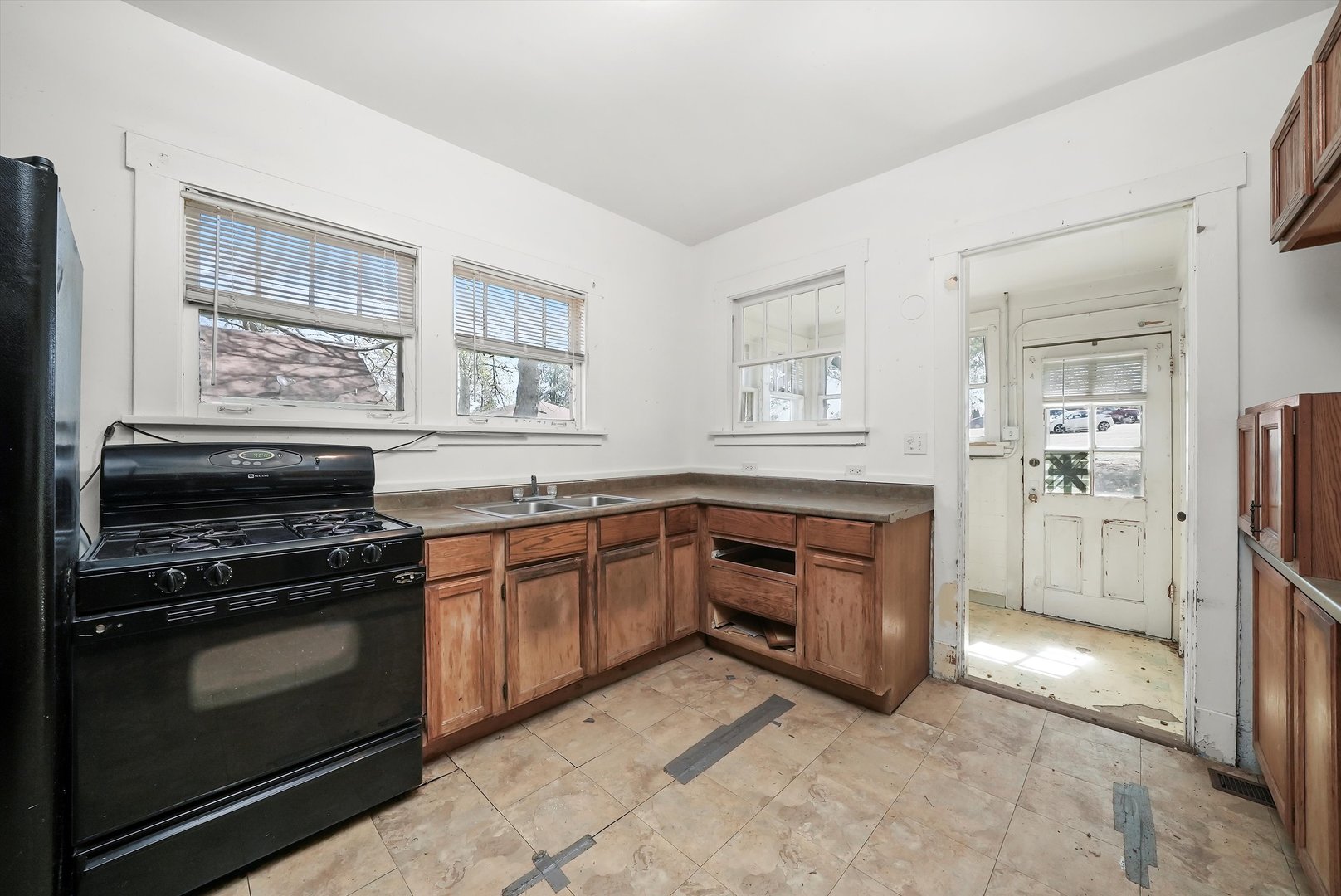 2405 North Club Road McHenry, IL 60051 - Photo 13 of 25 a kitchen with stainless steel appliances granite countertop a stove and a refrigerator