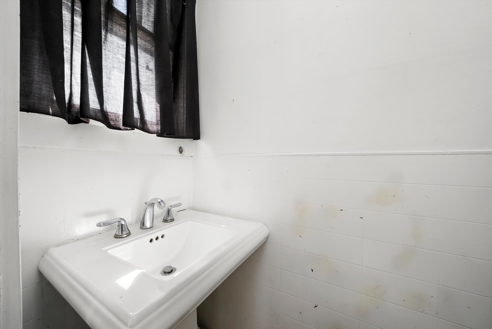 2405 North Club Road McHenry, IL 60051 - Photo 18 of 25 a bathroom with a sink and a mirror