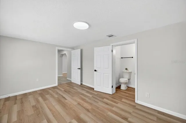 a bathroom with a sink a mirror and a shower