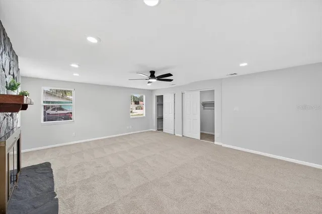 a view of a backyard with a garden and plants