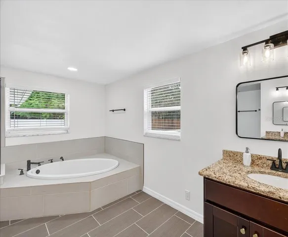 a view of backyard with tree