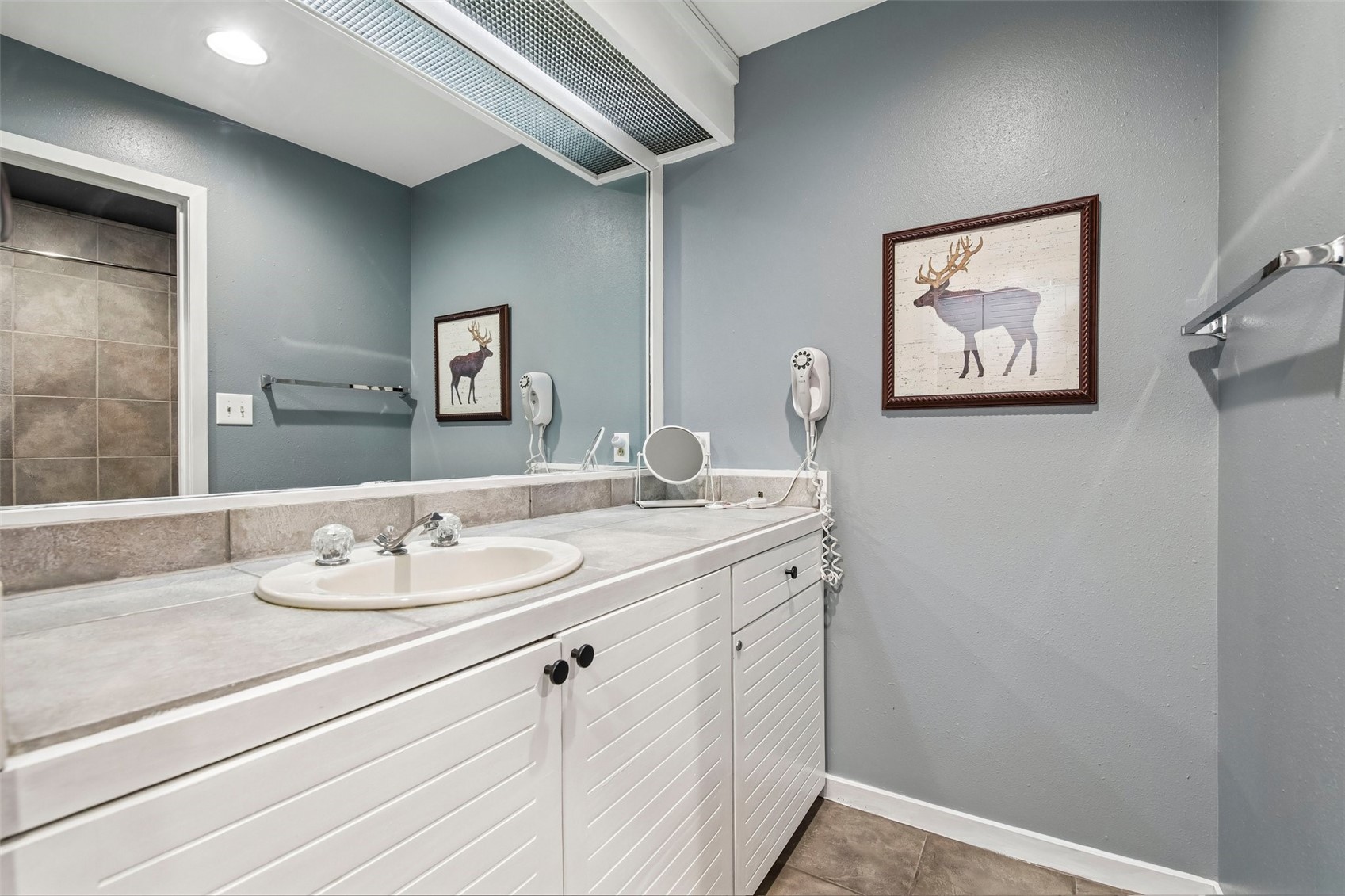 1211 West Keystone Road, Unit 2747 Keystone, CO 80435 - Photo 12 of 31 a bathroom with a sink and a mirror