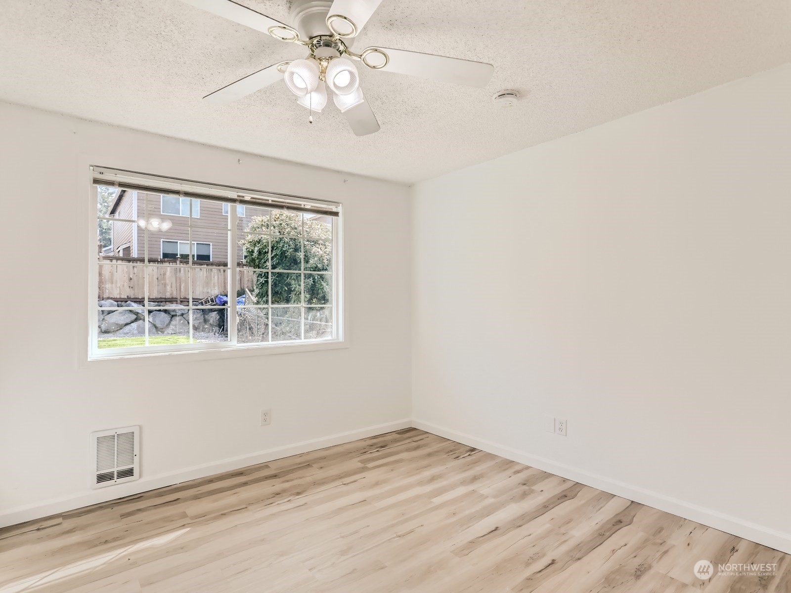 9211 3rd Place Southeast Everett, WA 98208 - Photo 16 of 20 an empty room with a window