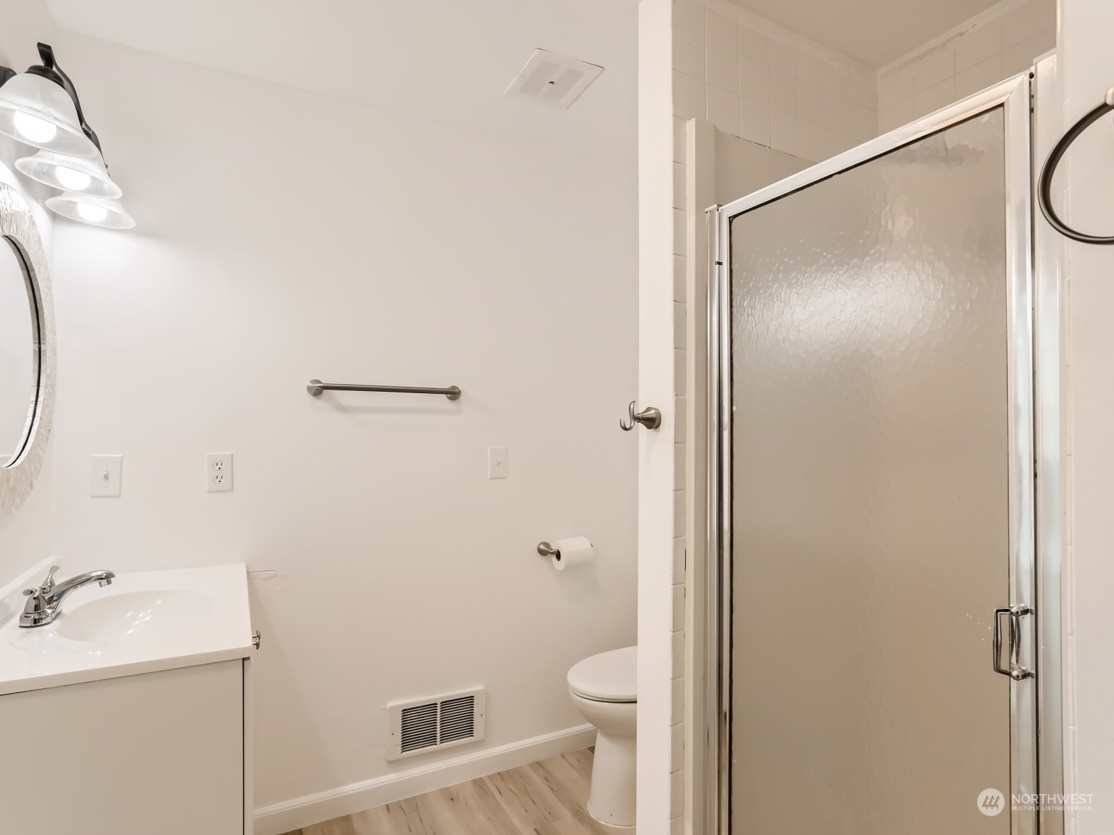 9211 3rd Place Southeast Everett, WA 98208 - Photo 17 of 20 a bathroom with a sink a toilet and shower