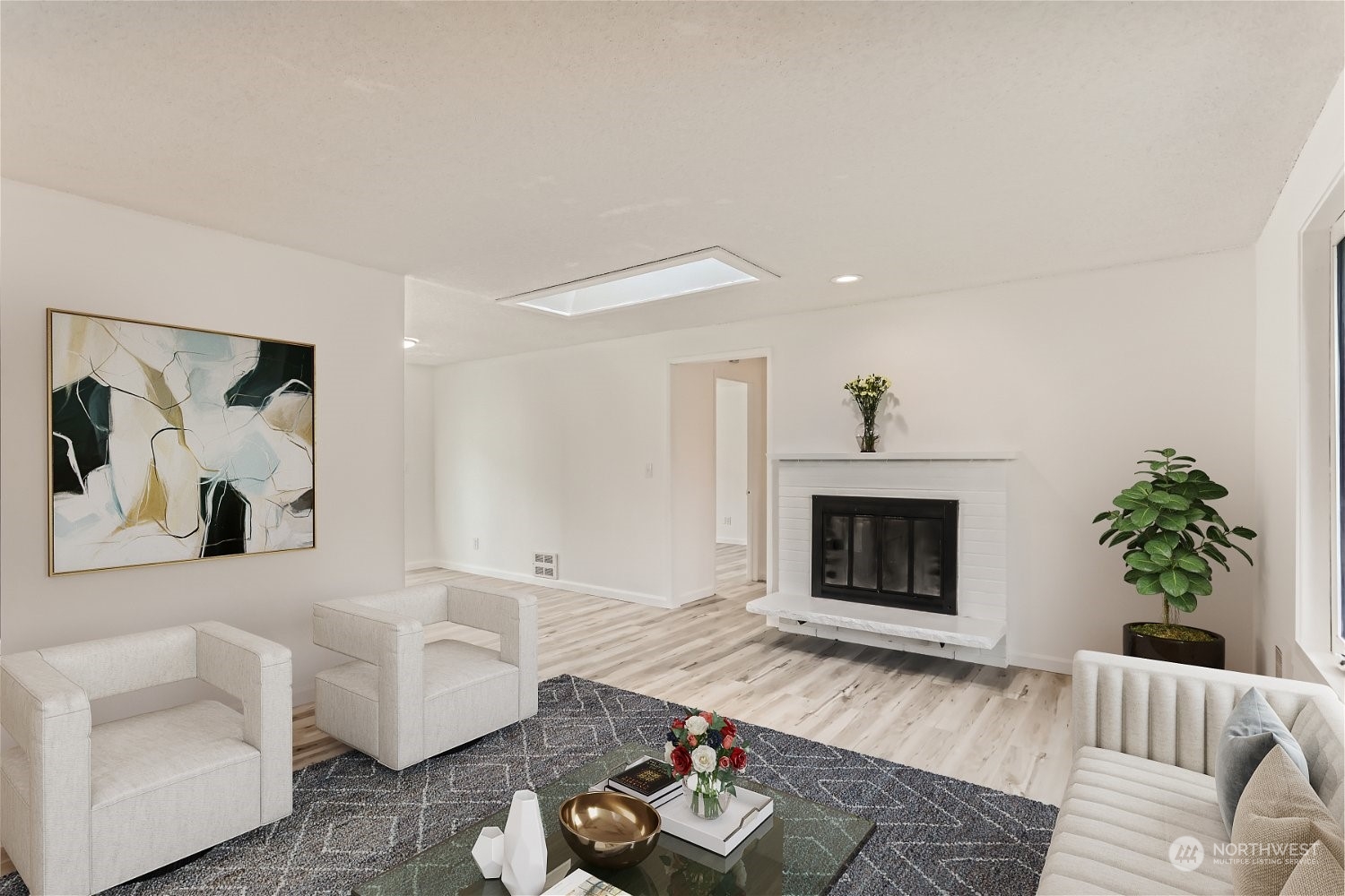 9211 3rd Place Southeast Everett, WA 98208 - Photo 2 of 20 a living room with furniture and a fireplace