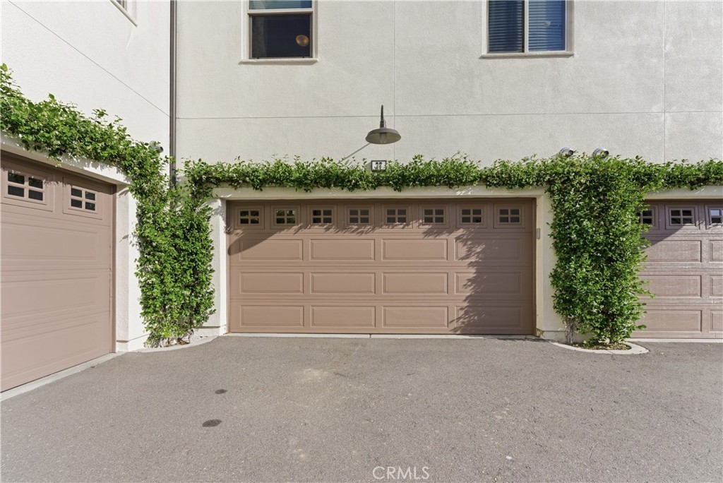 77 Adelfa Street Rancho Mission Viejo, CA 92694 - Photo 44 of 64 2 car garage with storage ,tankless water heater and Tesla charger!