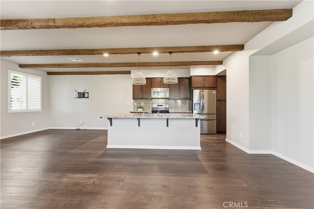 77 Adelfa Street Rancho Mission Viejo, CA 92694 - Photo 10 of 64 Beautiful wood floors, beams and views!