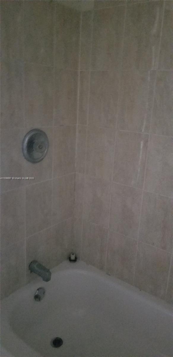 1759 Northwest 18th Terrace Miami, FL 33125 - Photo 10 of 10 a bathroom with a shower