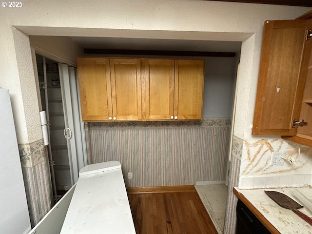 7144 Southwest Murray Boulevard Beaverton, OR 97008 - Photo 6 of 12 a view of a closet area with wooden floor