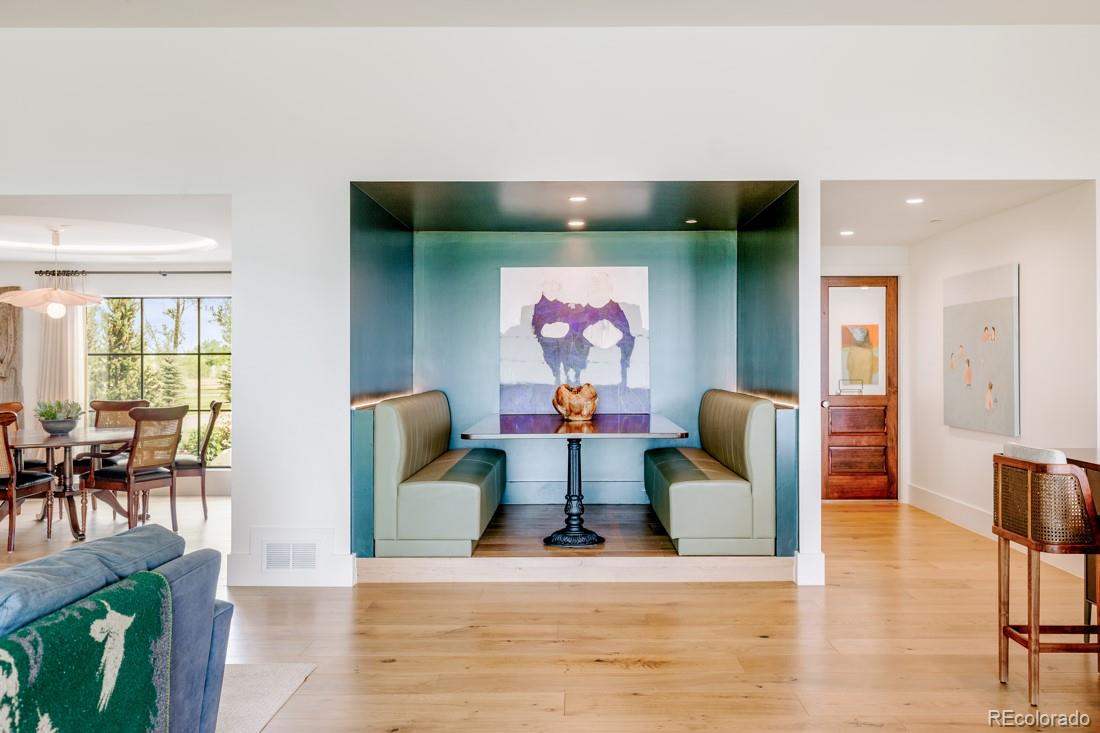 6122 Monarch Road Longmont, CO 80503 - Photo 34 of 40 a living room with furniture and a flat screen tv