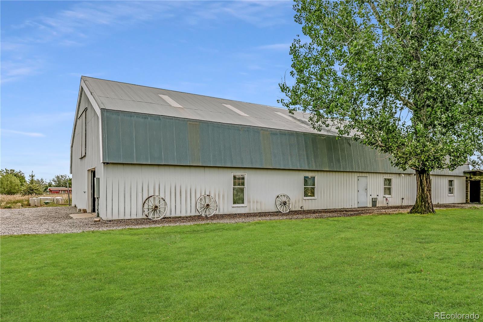 6122 Monarch Road Longmont, CO 80503 - Photo 38 of 40 a front view of a house with garden