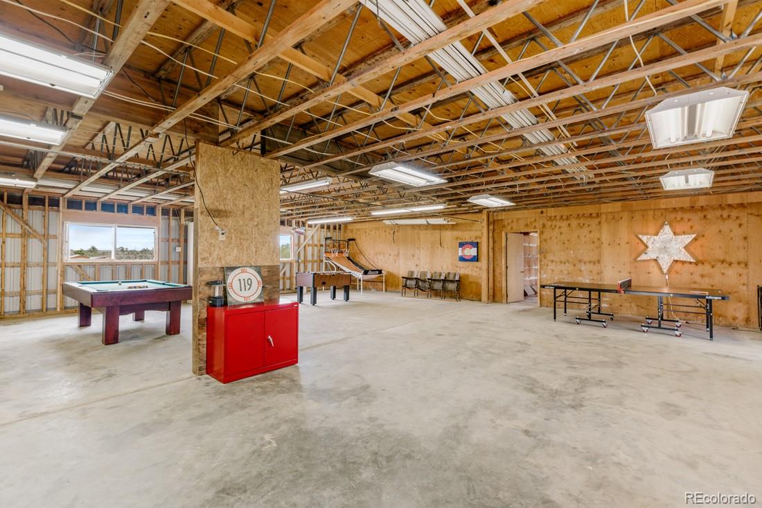 6122 Monarch Road Longmont, CO 80503 - Photo 39 of 40 a view of a room with gym equipment