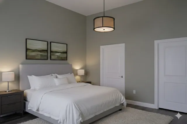 a bedroom with a bed and window