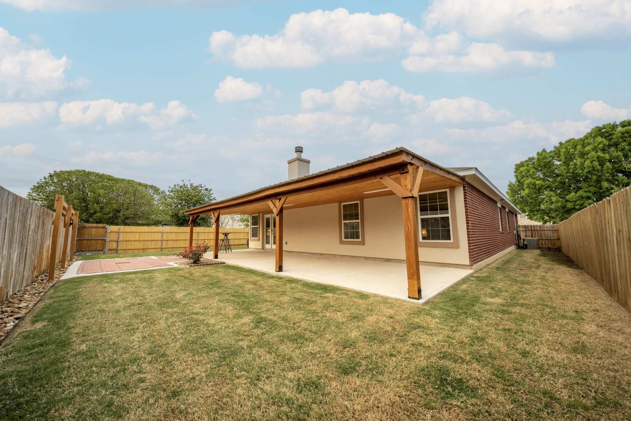 1302 Newbury Street Georgetown, TX 78626 - Photo 19 of 20 a view of a backyard of house