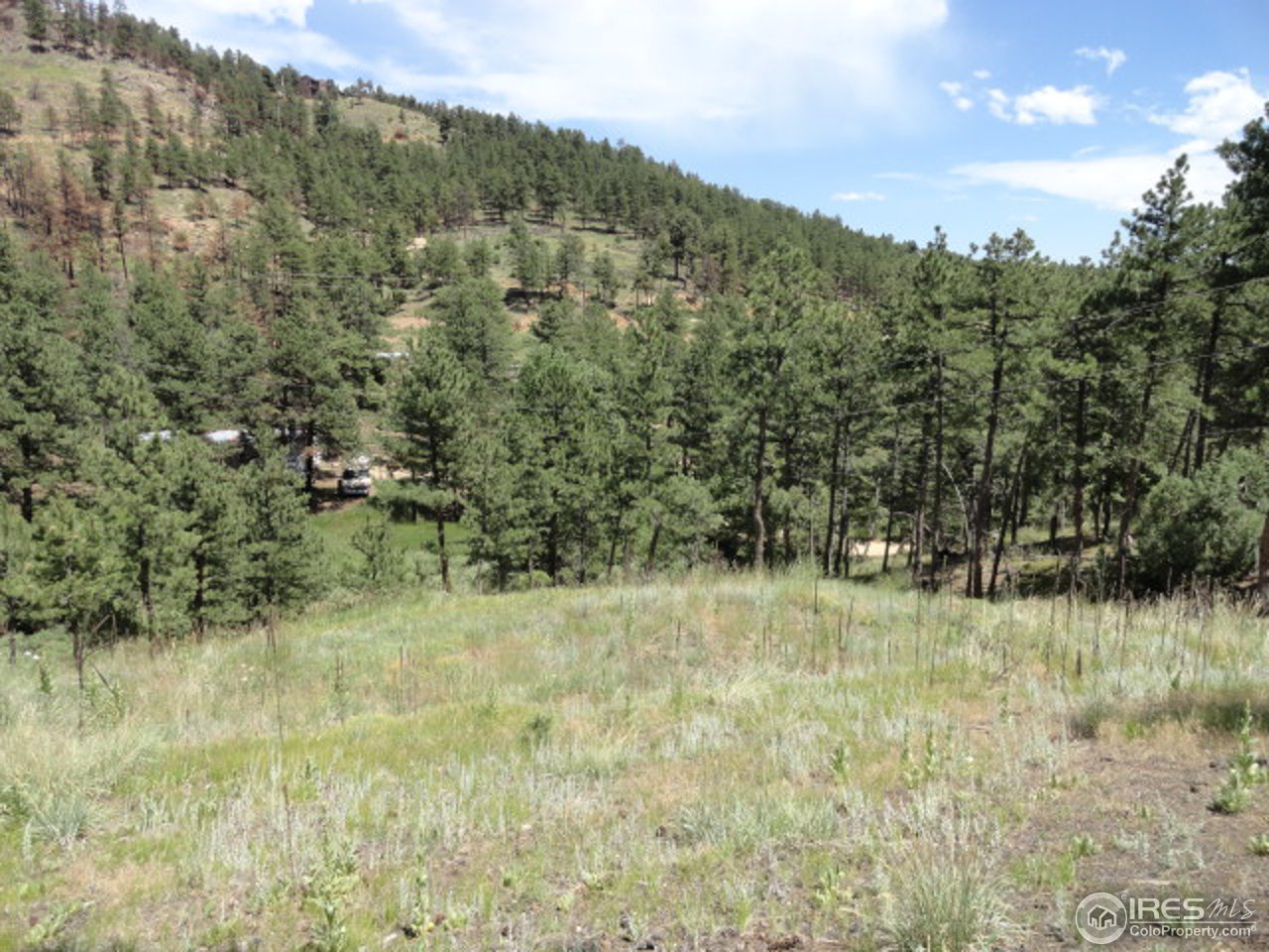 375 Arroyo Chico Boulder, CO 80302 - Photo 1 of 15 a view of a lake view