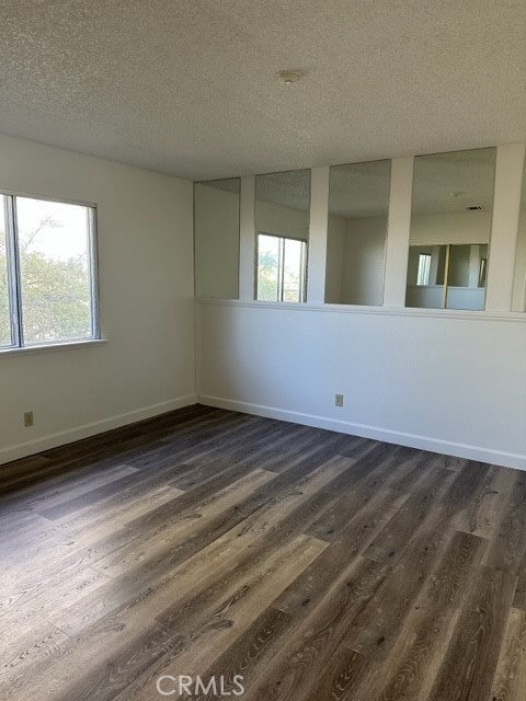 14952 Ritter Street, Unit C Victorville, CA 92394 - Photo 4 of 8 a view of an empty room and window