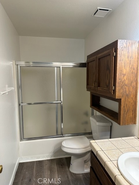 14952 Ritter Street, Unit C Victorville, CA 92394 - Photo 6 of 8 a bathroom with a sink toilet and shower