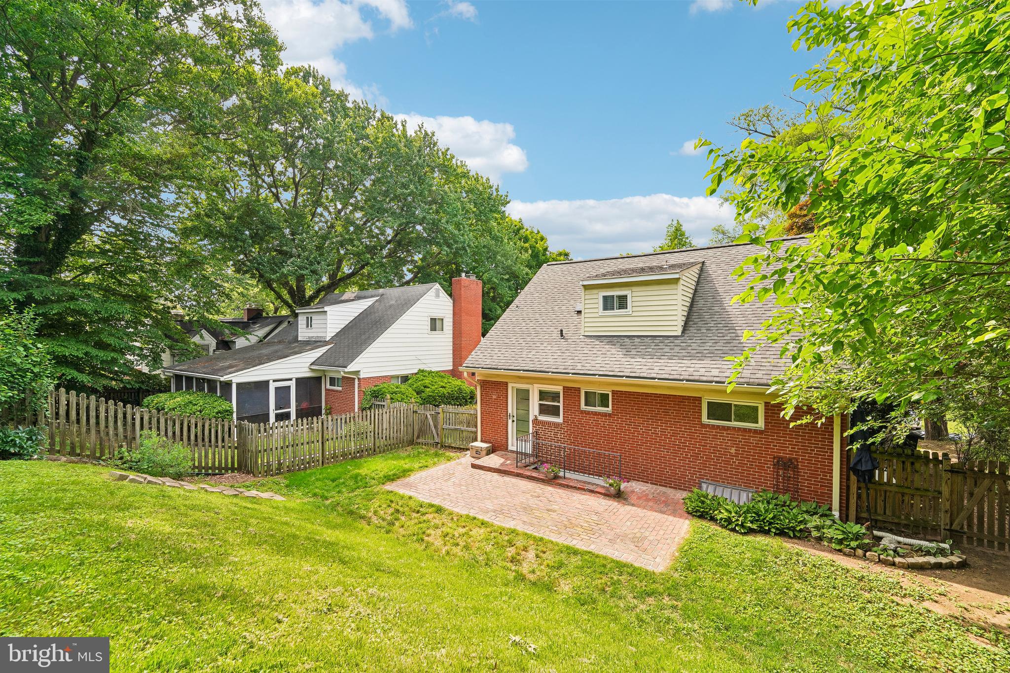 6640 Loch Hill Road Baltimore, MD 21239 - Photo 31 of 35 front view of a house with a yard