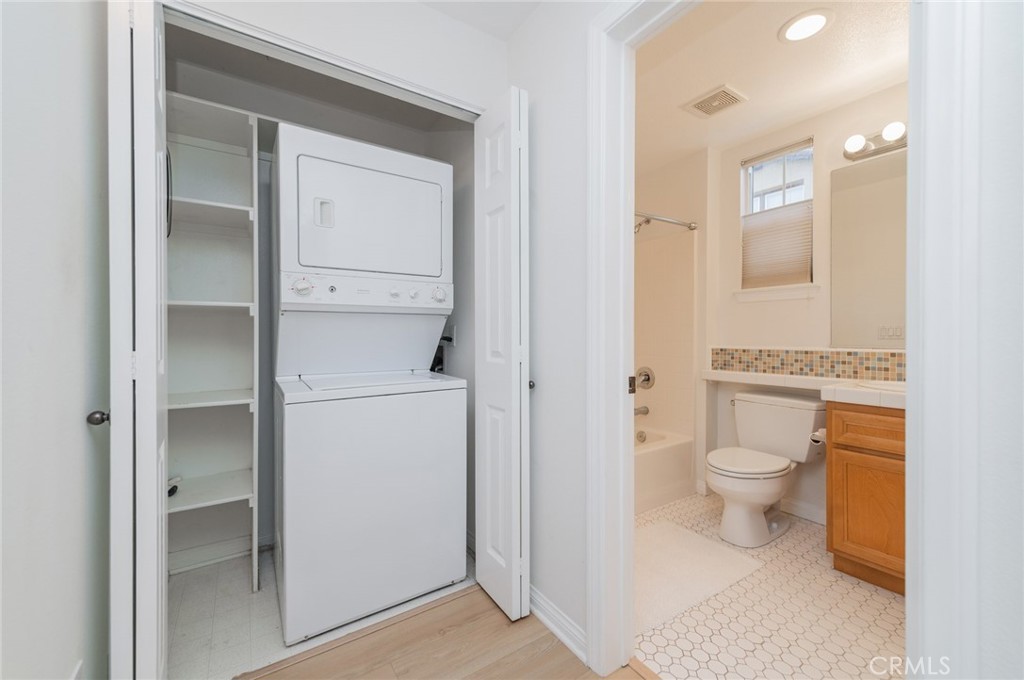 108 Jadestone Irvine, CA 92603 - Photo 14 of 24 a bathroom with a toilet and a shower