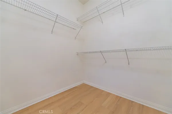 a view of a room with racks on the wall