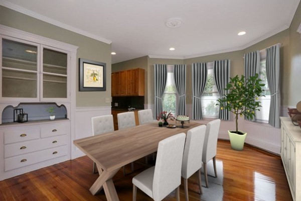 12 White Avenue, Unit 3 Brookline, MA 02467 - Photo 2 of 24 a dining room with furniture and window
