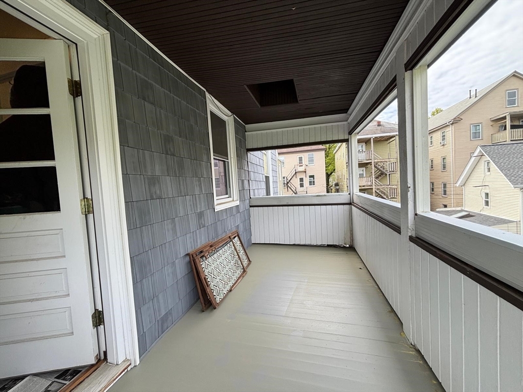 12 White Avenue, Unit 3 Brookline, MA 02467 - Photo 22 of 24 a view of an empty room and a window
