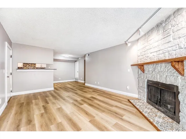 a view of a livingroom with a fireplace