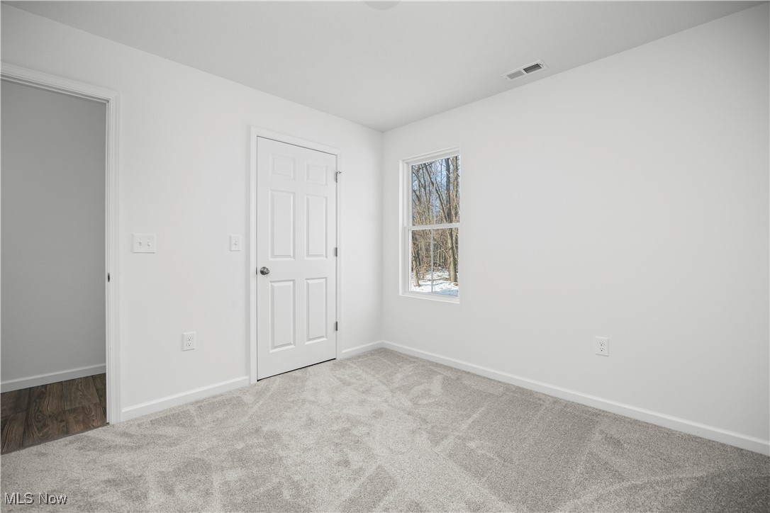 1999 East Oldgate Road Sandusky, OH 44870 - Photo 29 of 32 Unfurnished bedroom with baseboards and carpet floors