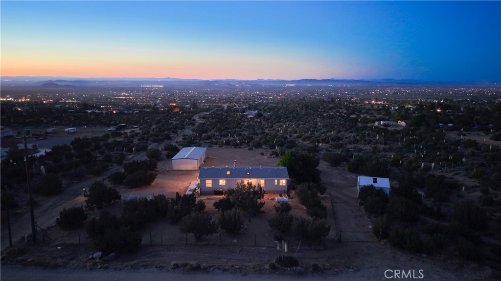 1330 Tamarack Road Pinon Hills, CA 92372 - Photo 4 of 19 an aerial view of house with yard and mountain view in back