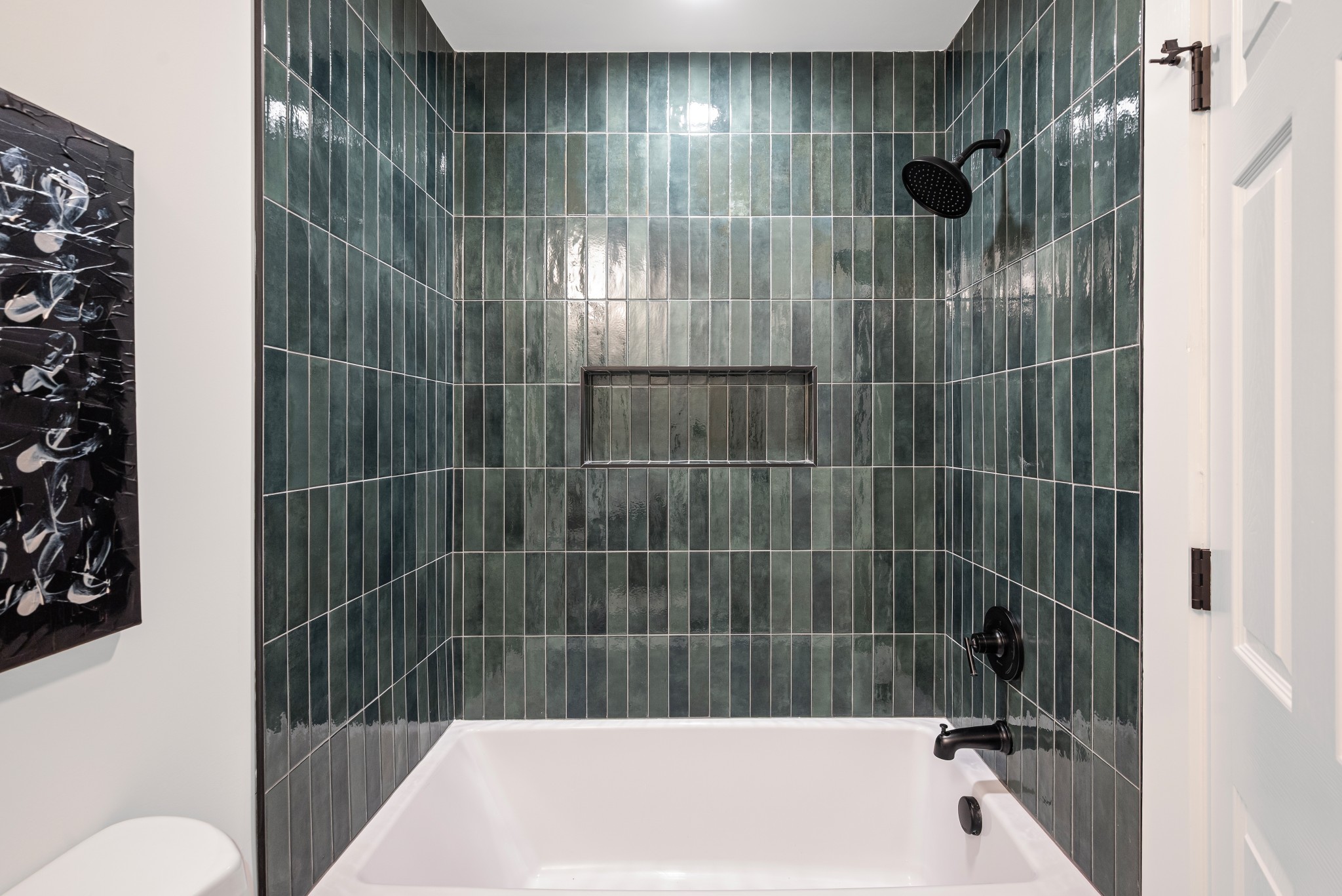 1815 3rd Avenue North Nashville, TN 37208 - Photo 16 of 44 a bathroom with a bathtub and a shower