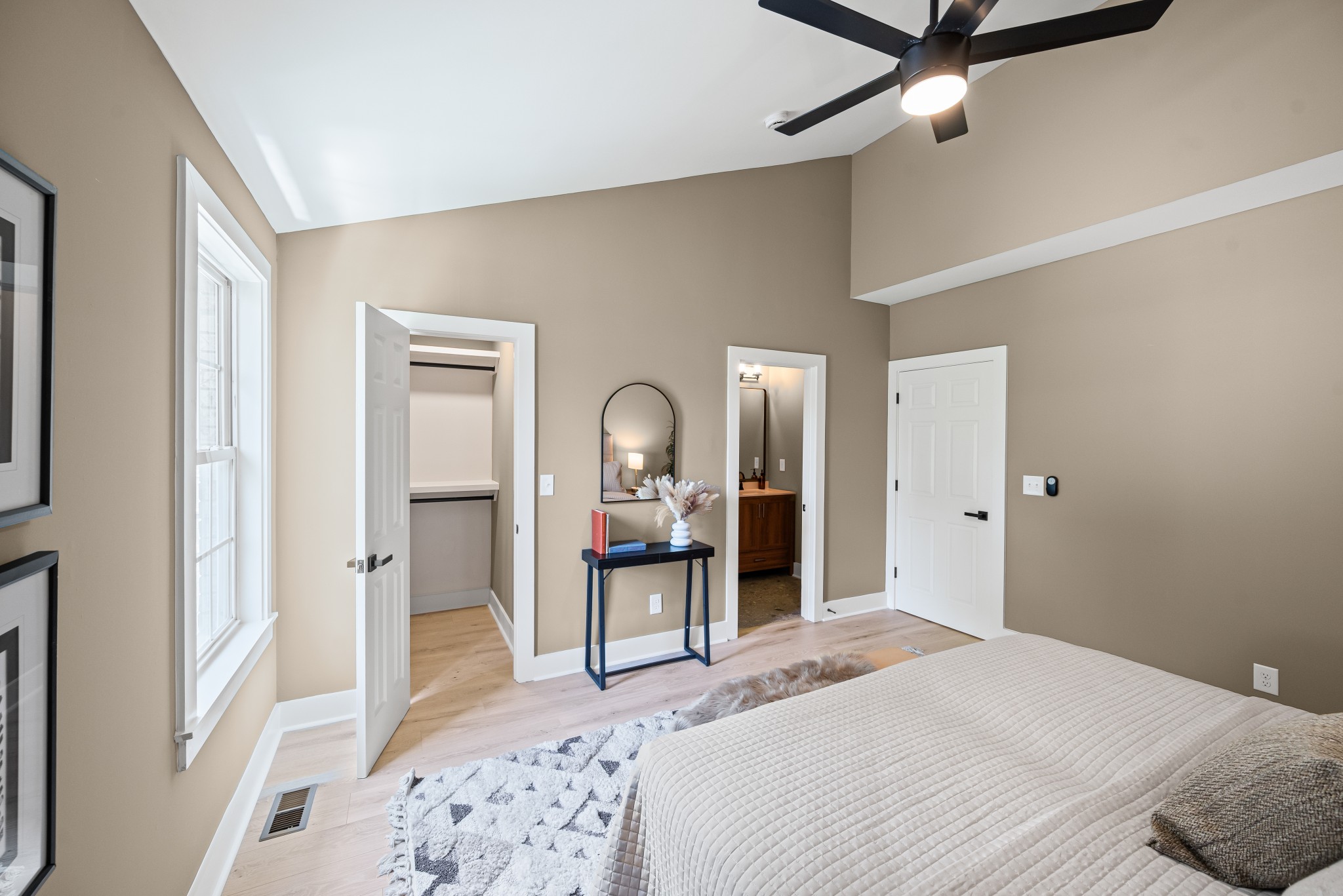 1815 3rd Avenue North Nashville, TN 37208 - Photo 25 of 44 a bedroom with a bed and a mirror on a dresser