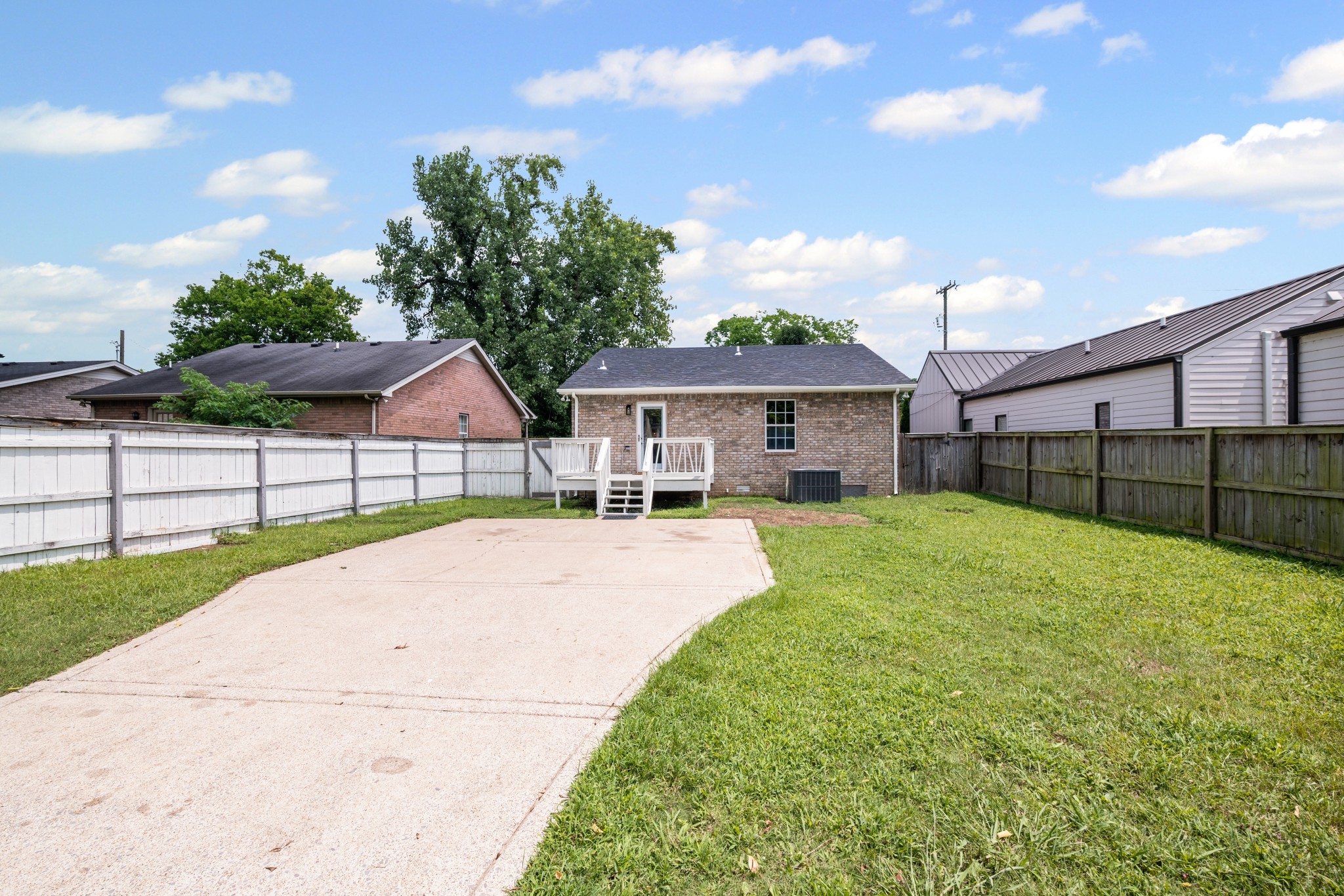 1815 3rd Avenue North Nashville, TN 37208 - Photo 33 of 44 a front view of a house with a garden and yard