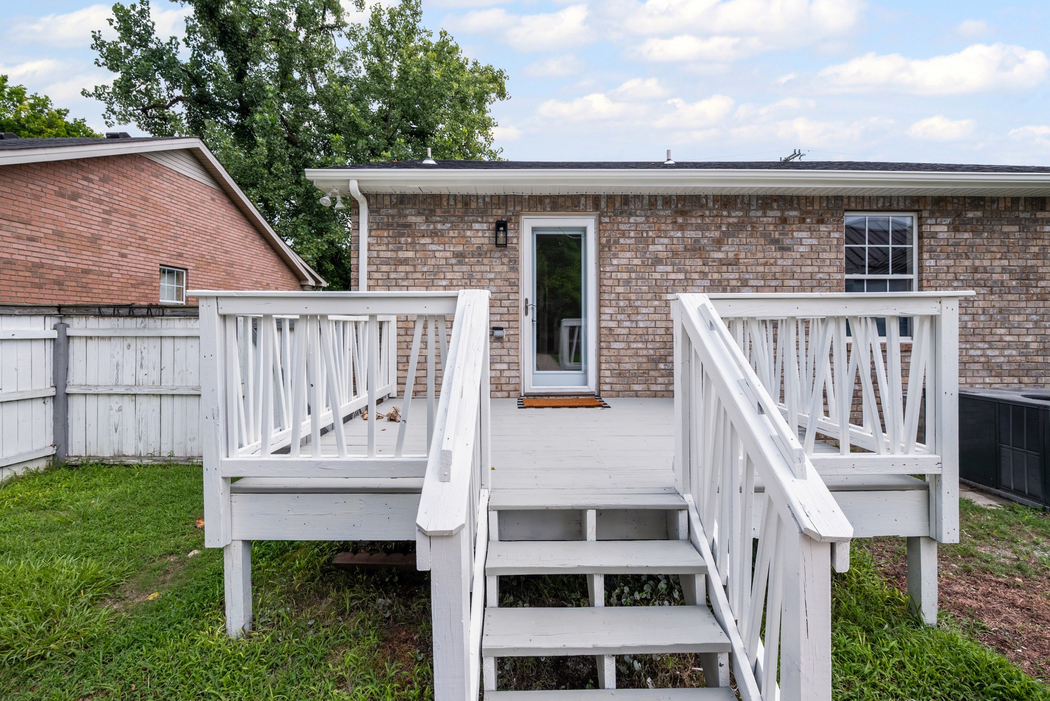 1815 3rd Avenue North Nashville, TN 37208 - Photo 34 of 44 a view of a patio with a table and a chairs