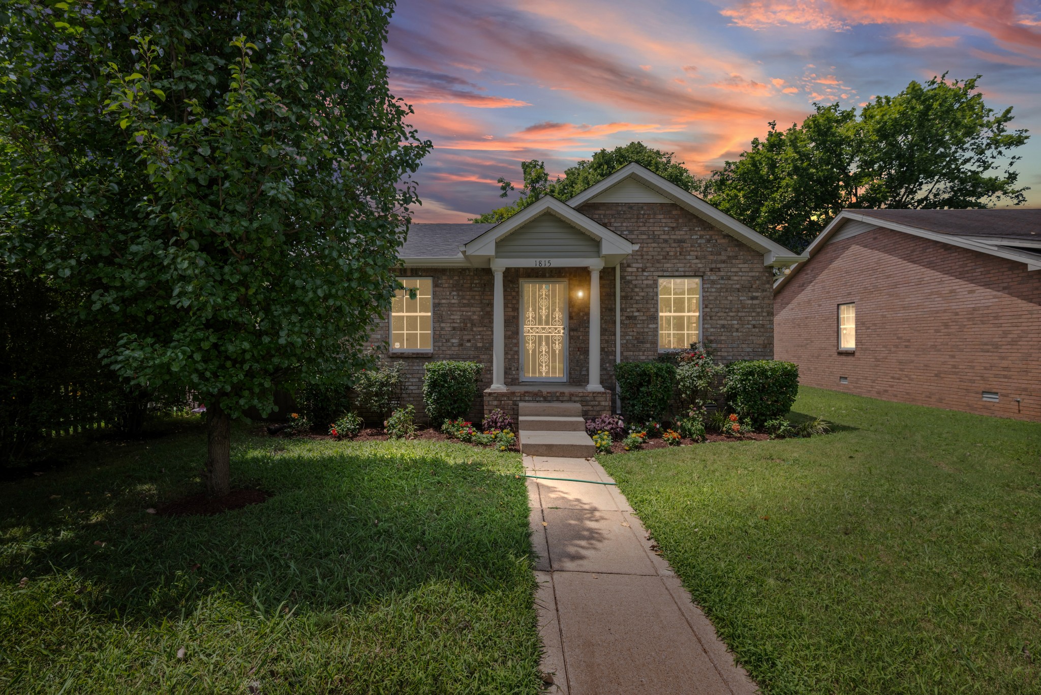 1815 3rd Avenue North Nashville, TN 37208 - Photo 40 of 44 a front view of a house with a yard