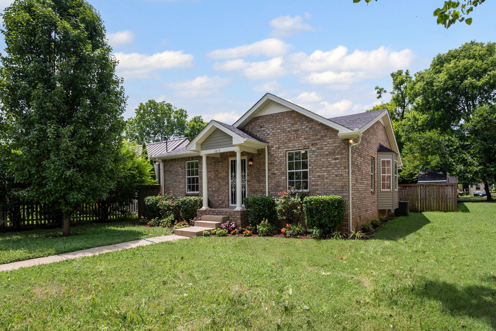 1815 3rd Avenue North Nashville, TN 37208 - Photo 43 of 44 a front view of house with yard and green space