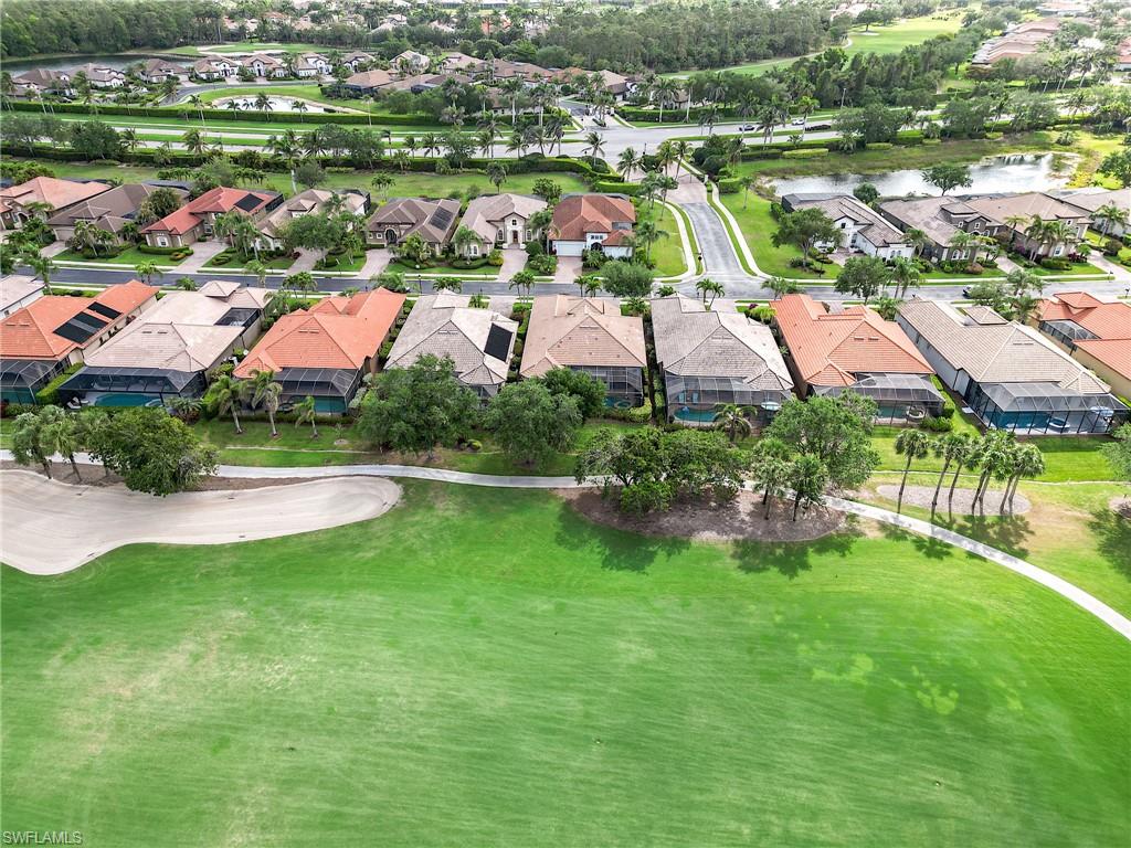 7699 Cottesmore Drive Naples, FL 34113 - Photo 5 of 37 a view of a city