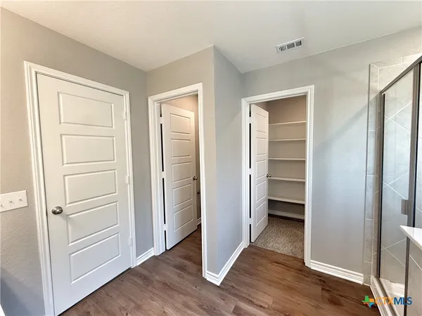 a bathroom with a toilet sink and a bathtub