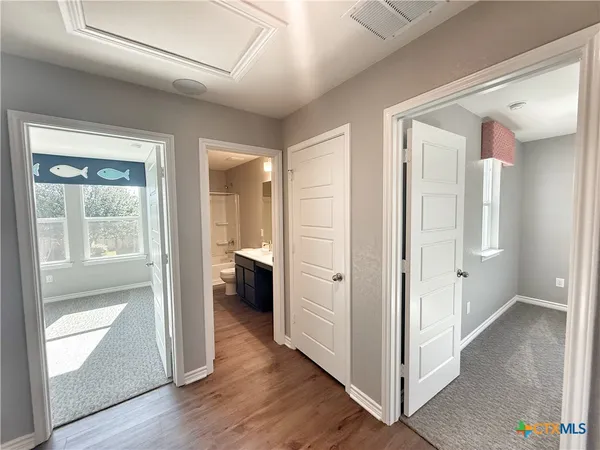 an empty room with windows