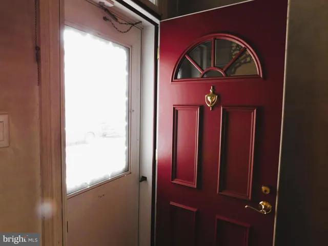 a front view of a house with a door