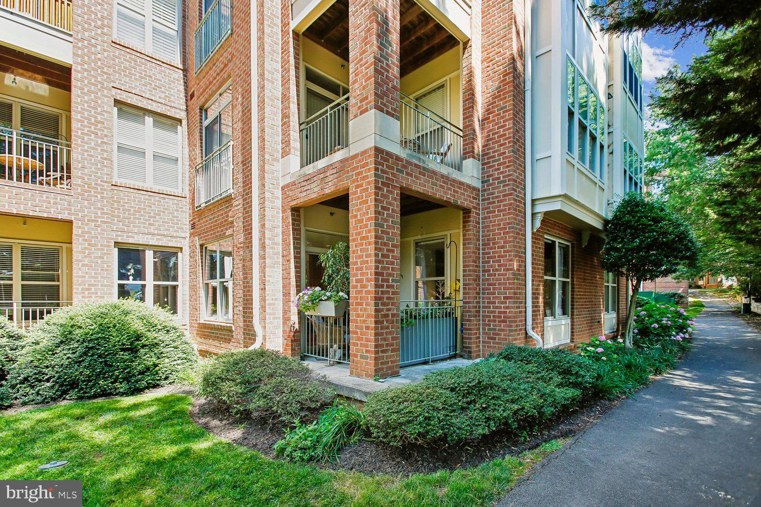 1855 Stratford Park Place, Unit 103 Reston, VA 20190 - Photo 37 of 49 Back Elevation