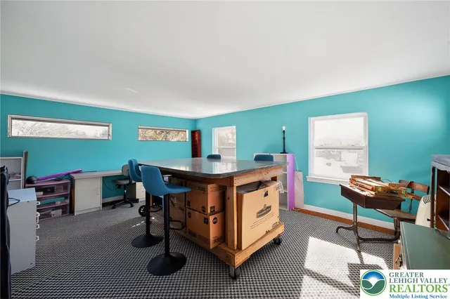 a room with furniture and a window