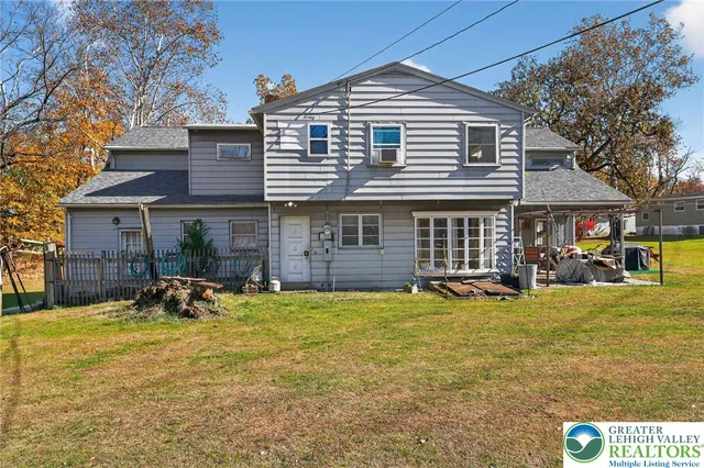 a front view of a house with patio