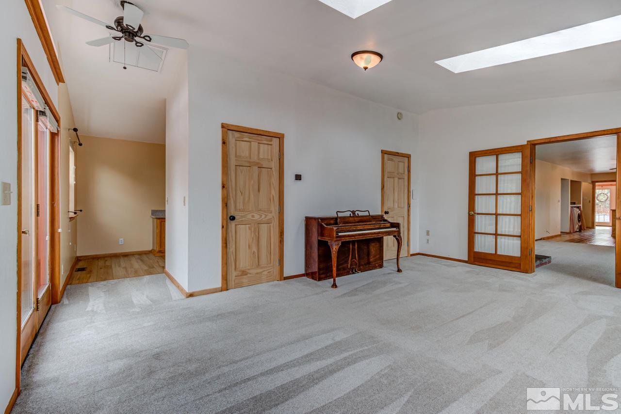 15920 Toll Road Reno, NV 89521 - Photo 17 of 24 a view of livingroom with furniture and workspace