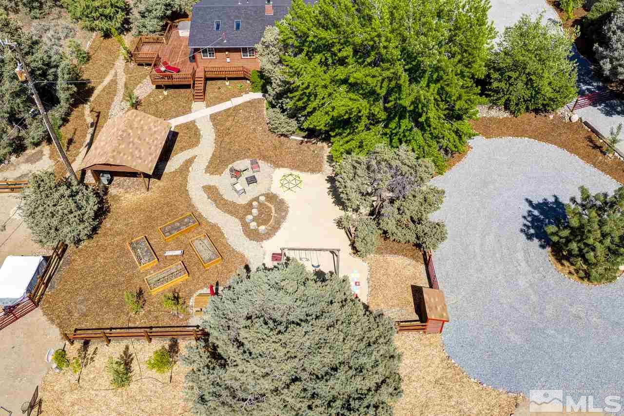 15920 Toll Road Reno, NV 89521 - Photo 24 of 24 an aerial view of a house a yard and a fountain