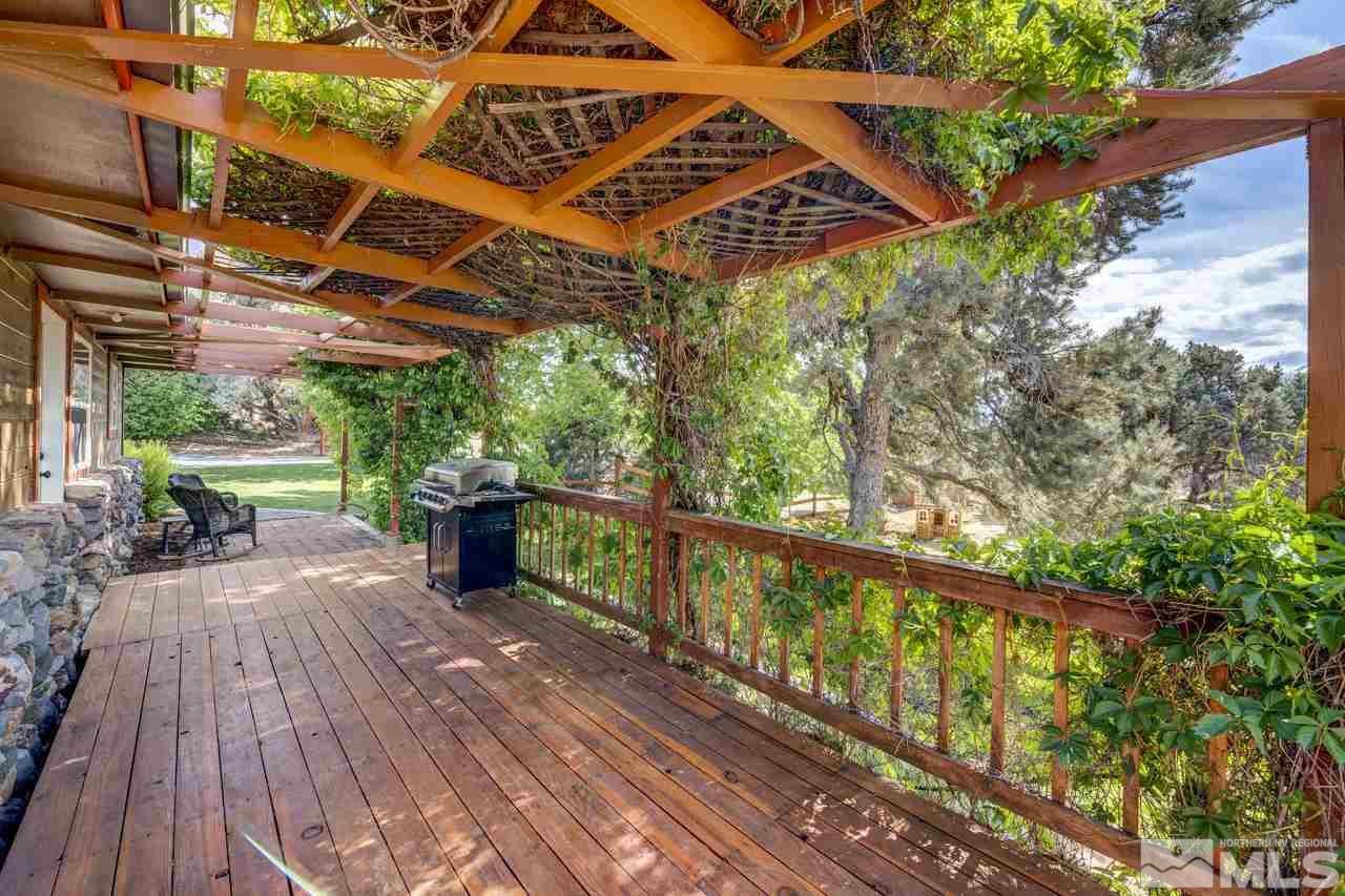 15920 Toll Road Reno, NV 89521 - Photo 5 of 24 a view of a balcony with wooden floor