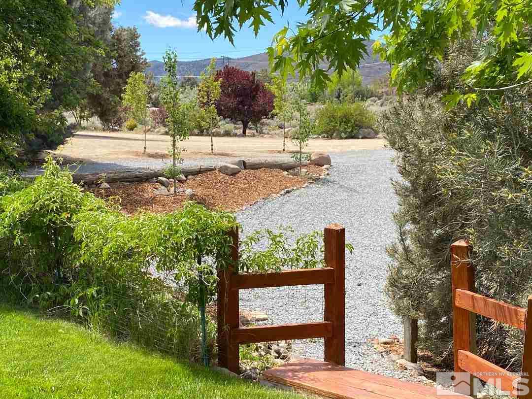 15920 Toll Road Reno, NV 89521 - Photo 9 of 24 a view of a yard with an outdoor space