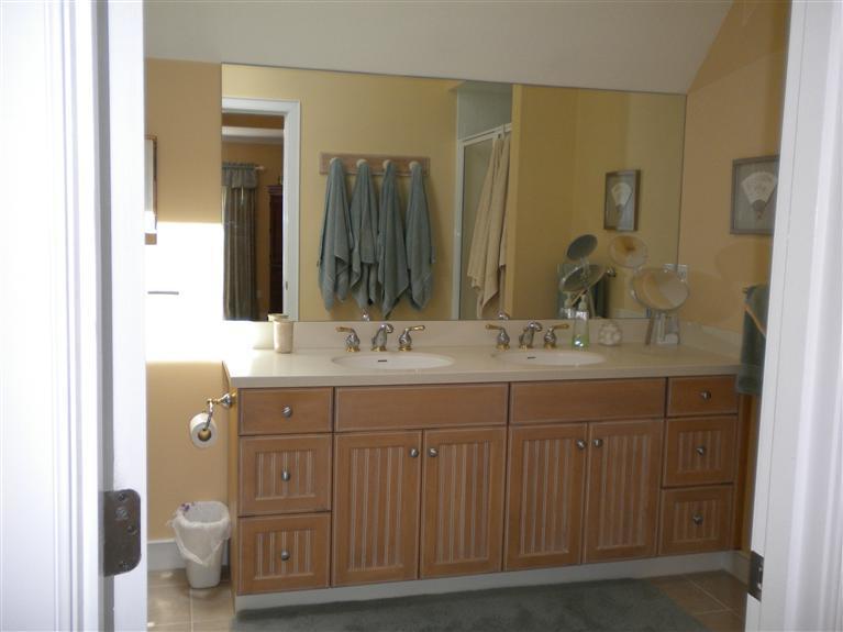 146 Cairn Ridge Road East Falmouth, MA 02536 - Photo 15 of 29 a bathroom with a double vanity sink and a mirror