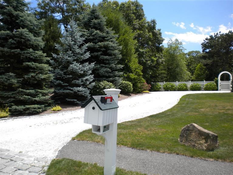 146 Cairn Ridge Road East Falmouth, MA 02536 - Photo 2 of 29 a view of a park with large trees